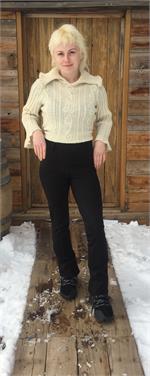 women wearing cream sweater and black classic weight no patch cargo pocket boot cut pant